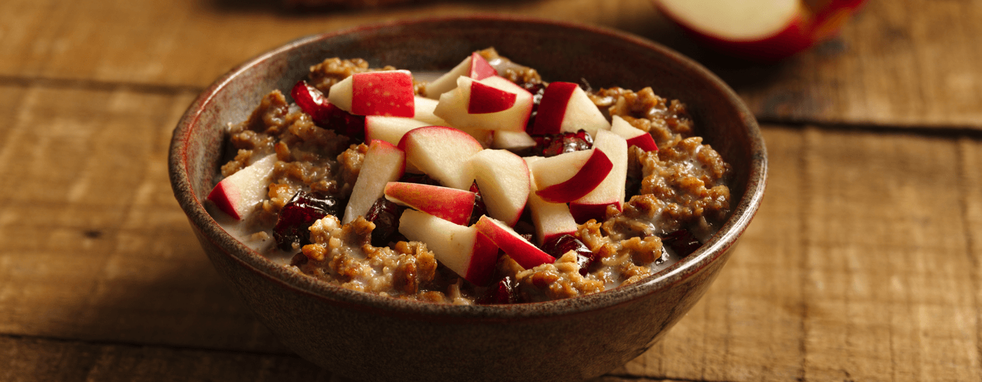 Bowl of granola with apple chunks